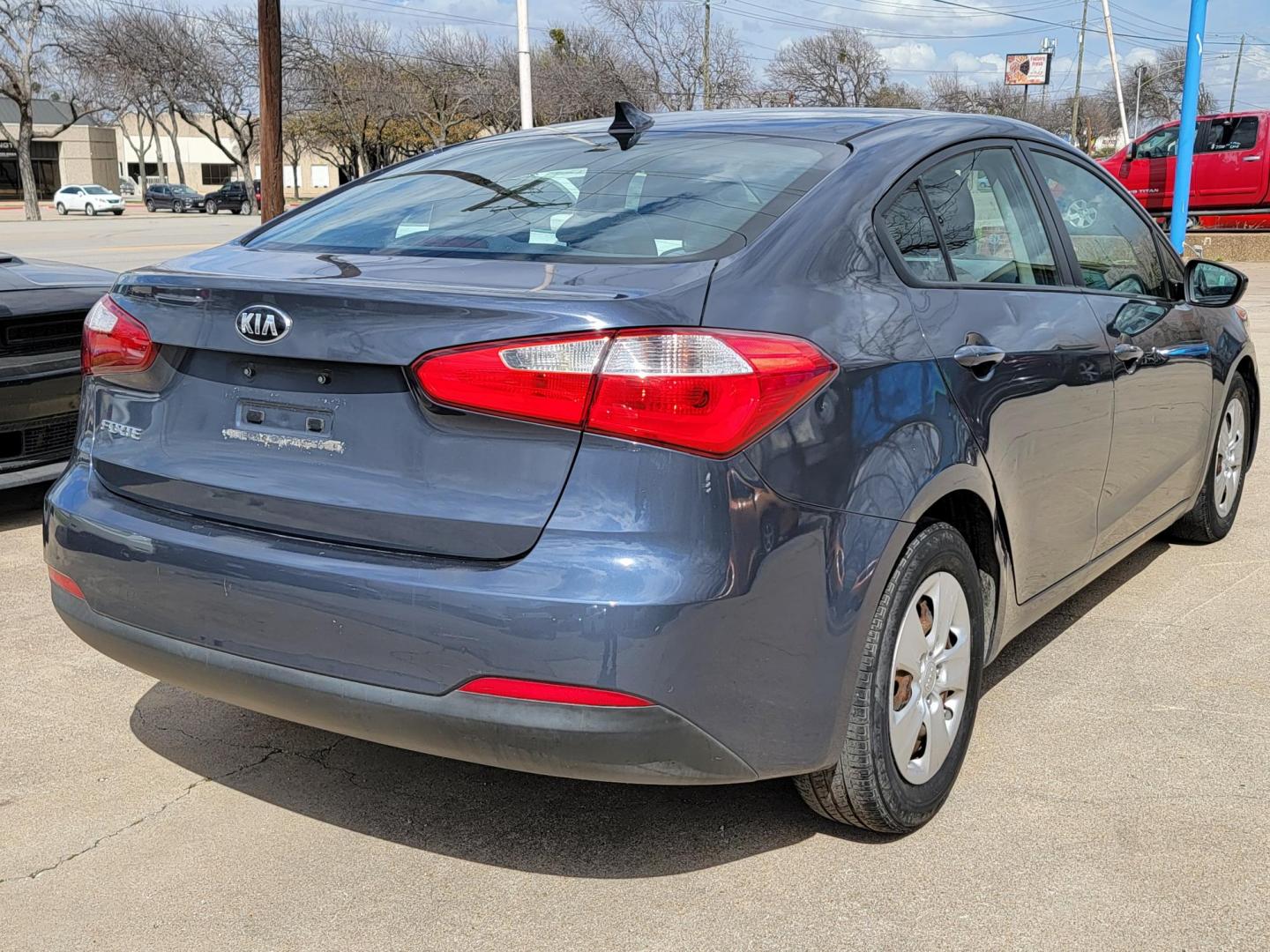 2016 Blue /Black Kia Forte LX w/Popular Package (KNAFK4A60G5) with an 1.8L L4 DOHC 16V engine, Automatic transmission, located at 2020 East Division Street, Arlington, TX, 76011, (817) 801-3191, 32.742390, -97.076874 - 2016 Kia Forte LX w-Popular Package for sale in Dallas, Texas. No credit score (check) required. Buy here pay here dealership that has a in house lease with a purchase option. - Photo#2