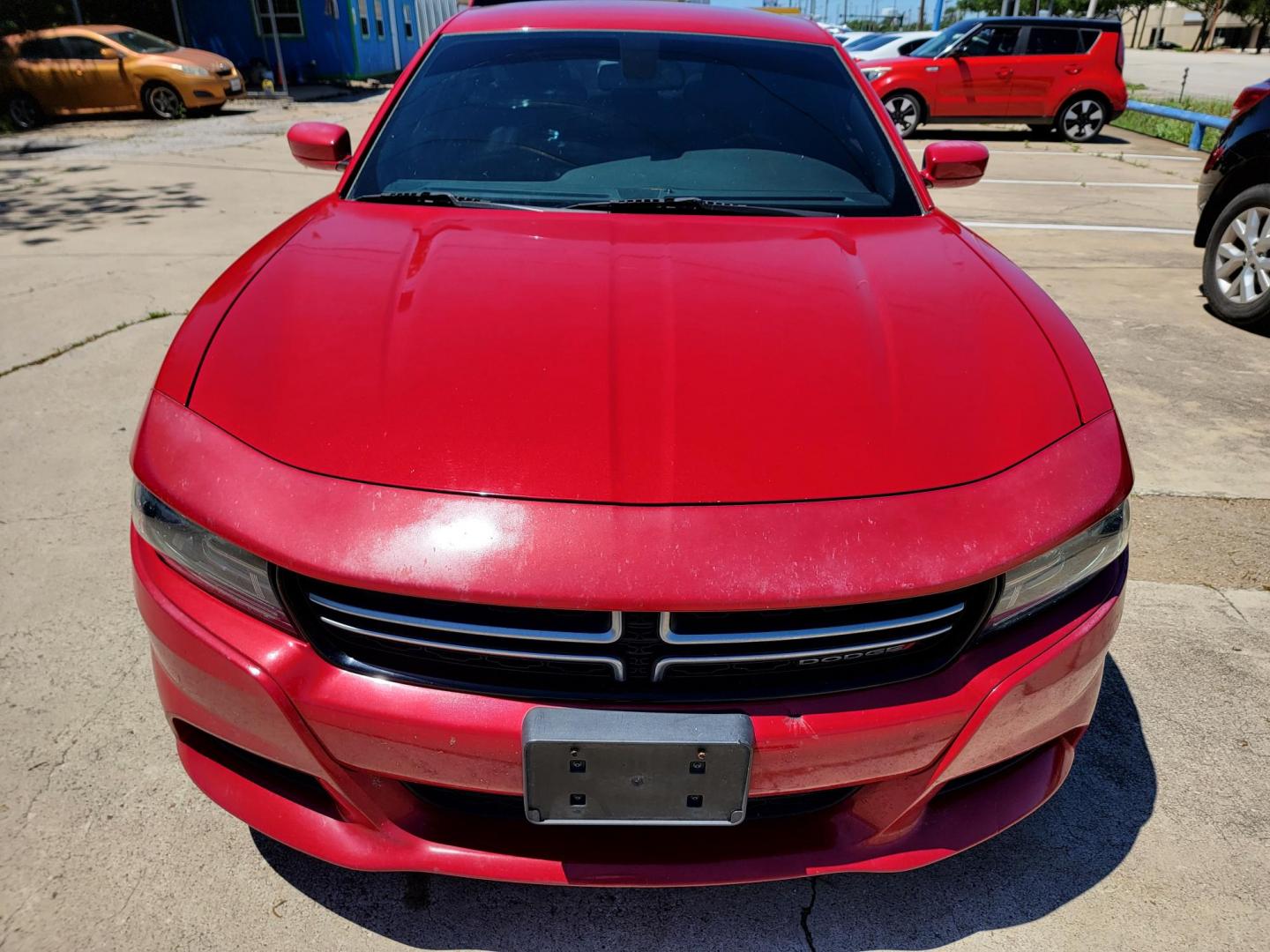 2016 Red /Black Dodge Charger SE (2C3CDXBG7GH) with an 3.6L V6 DOHC 24V engine, 8A transmission, located at 2020 East Division Street, Arlington, TX, 76011, (817) 801-3191, 32.742390, -97.076874 - Texass premiere Buy Here Pay Here with No Credit Check {score} at 2020 East Division Street Arlington, Texas in the center of Dallas, Fort Worth metro area. For in house auto financing in Lancaster, Waxahachie, Cleburne or Sherman call 817-801-3191. Denton, McKinney, Waco and Weatherford shoppers wa - Photo#3