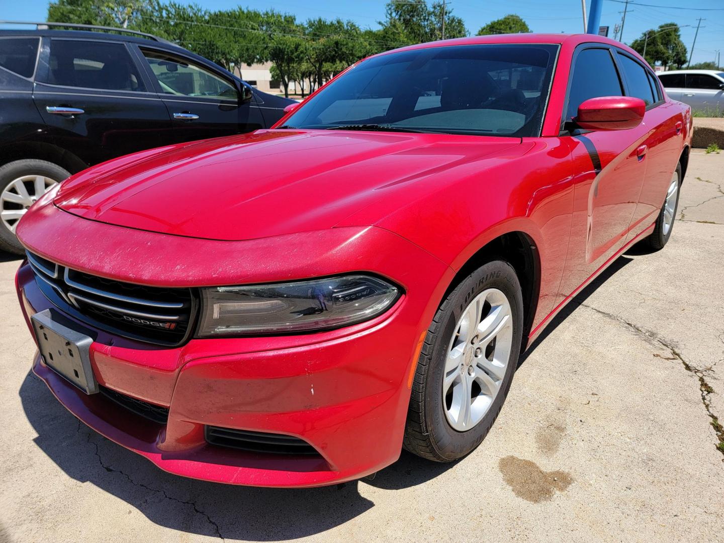 2016 Red /Black Dodge Charger SE (2C3CDXBG7GH) with an 3.6L V6 DOHC 24V engine, 8A transmission, located at 2020 East Division Street, Arlington, TX, 76011, (817) 801-3191, 32.742390, -97.076874 - Texass premiere Buy Here Pay Here with No Credit Check {score} at 2020 East Division Street Arlington, Texas in the center of Dallas, Fort Worth metro area. For in house auto financing in Lancaster, Waxahachie, Cleburne or Sherman call 817-801-3191. Denton, McKinney, Waco and Weatherford shoppers wa - Photo#7