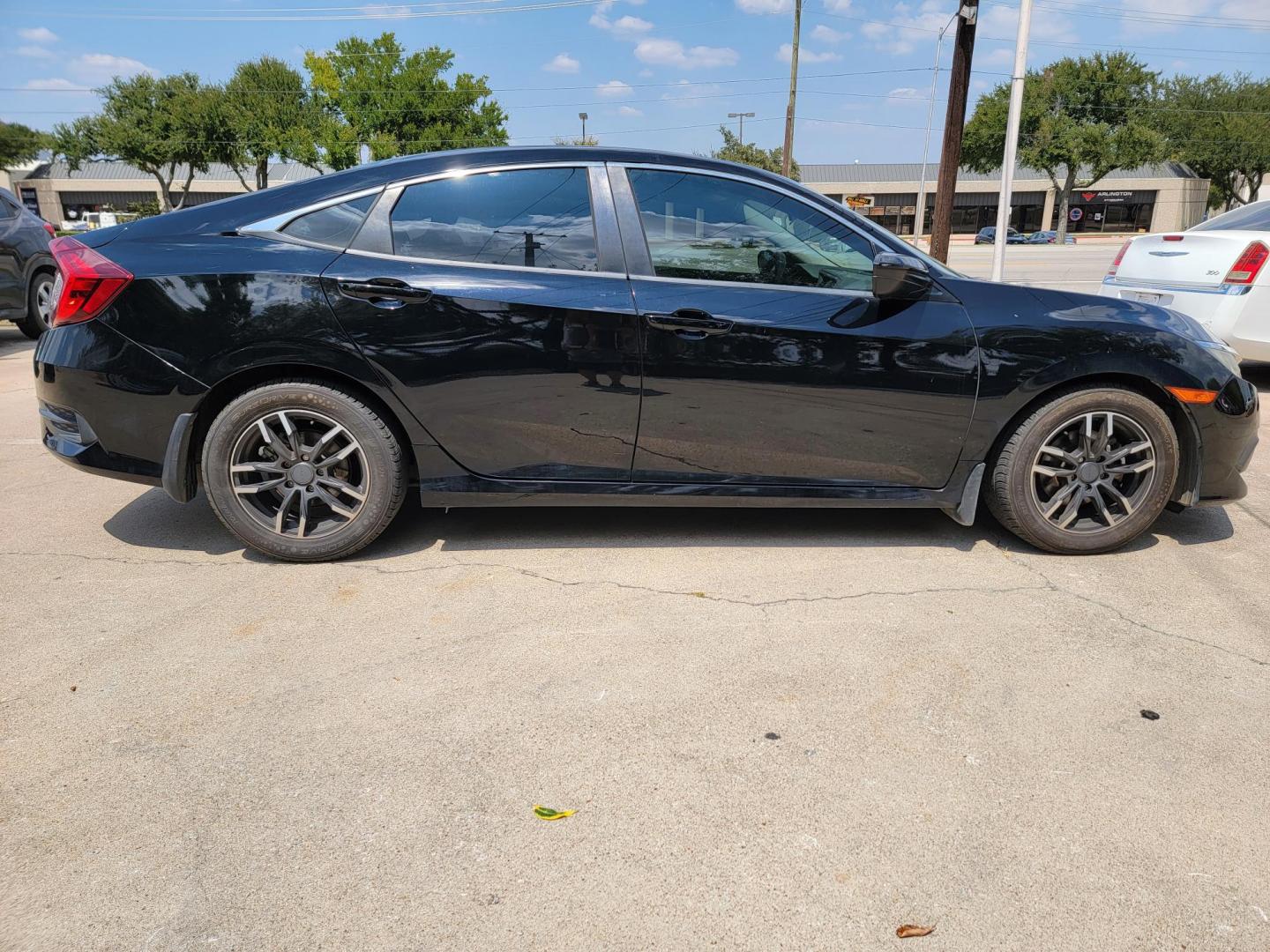 2016 Black Honda Civic LX Sedan CVT (19XFC2F51GE) with an 2.0L L4 DOHC 16V engine, CVT transmission, located at 2020 East Division Street, Arlington, TX, 76011, (817) 801-3191, 32.742390, -97.076874 - Texass premiere Buy Here Pay Here with No Credit Check {score} at 2020 East Division Street Arlington, Texas in the center of Dallas, Fort Worth metro area. For in house auto financing in Lancaster, Waxahachie, Cleburne or Sherman call 817-801-3191. Denton, McKinney, Waco and Weatherford shoppers wa - Photo#2