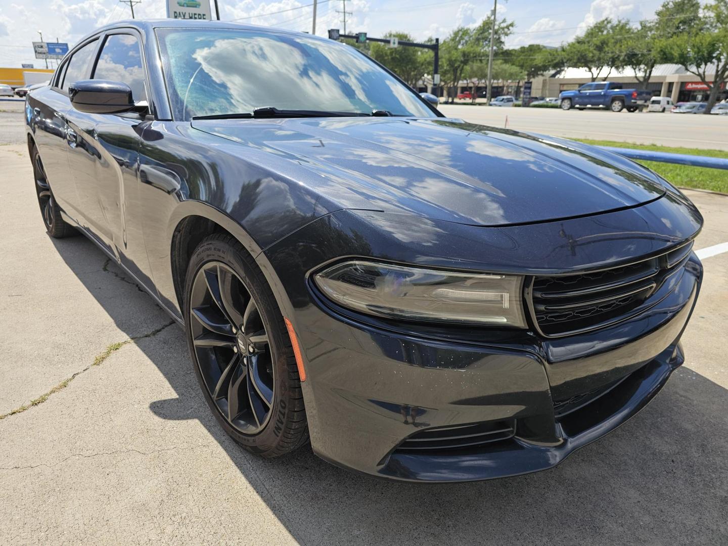 2016 GRAY /Dark Gray Dodge Charger SXT (2C3CDXHGXGH) with an 3.6 engine, Automatic transmission, located at 2020 East Division Street, Arlington, TX, 76011, (817) 801-3191, 32.742390, -97.076874 - This storm gray Dodge Charger is here for your next ride! Come check it out at DFW Carmart today! Premiere Buy Here Pay Here with NO Credit Check (score) at 2020 East Division Street, Arlington, Texas, located in the center of the Dallas/Fort Worth metro area. For in-house financing in Lancaster, - Photo#0