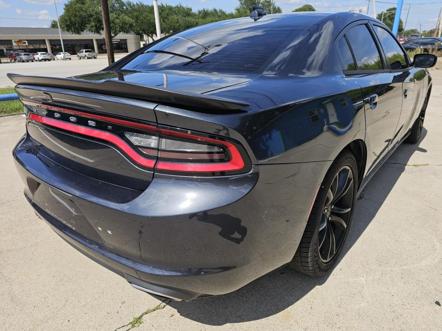 2016 GRAY /Dark Gray Dodge Charger SXT (2C3CDXHGXGH) with an 3.6 engine, Automatic transmission, located at 2020 East Division Street, Arlington, TX, 76011, (817) 801-3191, 32.742390, -97.076874 - This storm gray Dodge Charger is here for your next ride! Come check it out at DFW Carmart today! Premiere Buy Here Pay Here with NO Credit Check (score) at 2020 East Division Street, Arlington, Texas, located in the center of the Dallas/Fort Worth metro area. For in-house financing in Lancaster, - Photo#2