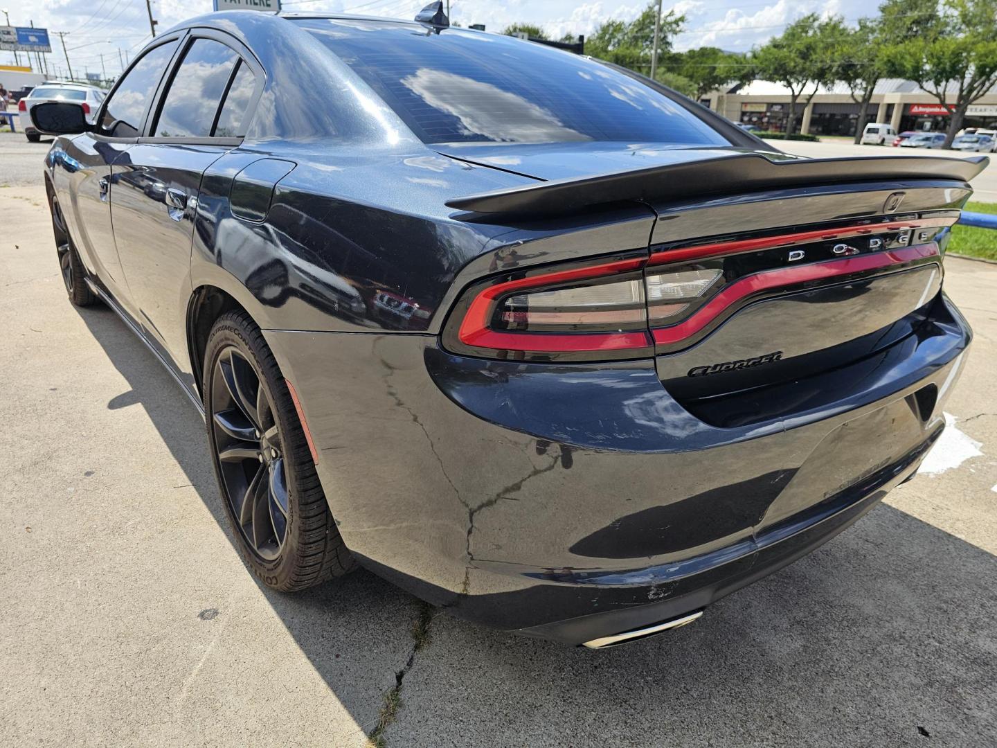2016 GRAY /Dark Gray Dodge Charger SXT (2C3CDXHGXGH) with an 3.6 engine, Automatic transmission, located at 2020 East Division Street, Arlington, TX, 76011, (817) 801-3191, 32.742390, -97.076874 - This storm gray Dodge Charger is here for your next ride! Come check it out at DFW Carmart today! Premiere Buy Here Pay Here with NO Credit Check (score) at 2020 East Division Street, Arlington, Texas, located in the center of the Dallas/Fort Worth metro area. For in-house financing in Lancaster, - Photo#4