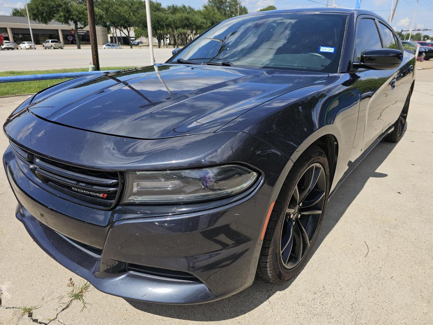 2016 GRAY /Dark Gray Dodge Charger SXT (2C3CDXHGXGH) with an 3.6 engine, Automatic transmission, located at 2020 East Division Street, Arlington, TX, 76011, (817) 801-3191, 32.742390, -97.076874 - This storm gray Dodge Charger is here for your next ride! Come check it out at DFW Carmart today! Premiere Buy Here Pay Here with NO Credit Check (score) at 2020 East Division Street, Arlington, Texas, located in the center of the Dallas/Fort Worth metro area. For in-house financing in Lancaster, - Photo#6