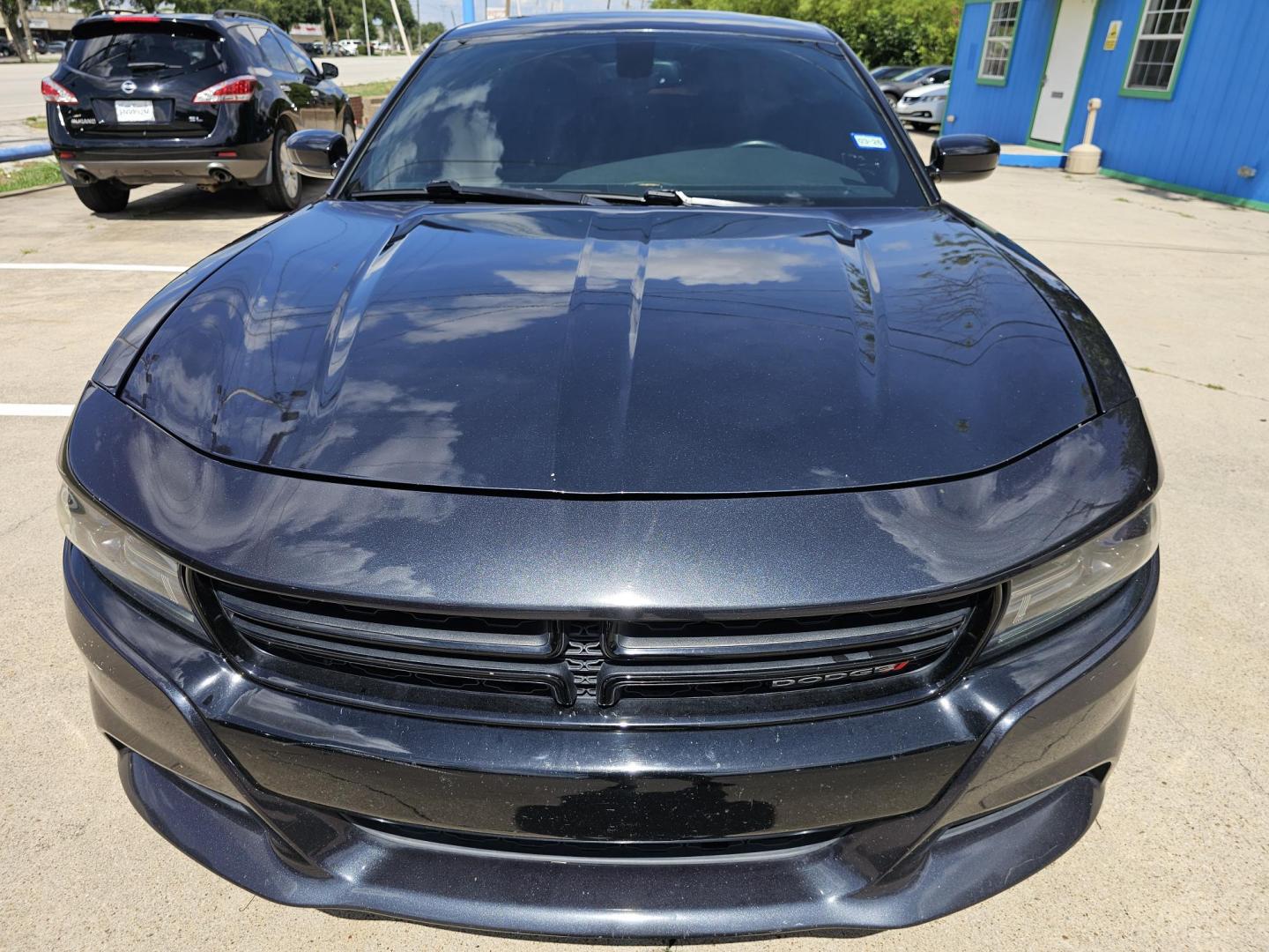 2016 GRAY /Dark Gray Dodge Charger SXT (2C3CDXHGXGH) with an 3.6 engine, Automatic transmission, located at 2020 East Division Street, Arlington, TX, 76011, (817) 801-3191, 32.742390, -97.076874 - This storm gray Dodge Charger is here for your next ride! Come check it out at DFW Carmart today! Premiere Buy Here Pay Here with NO Credit Check (score) at 2020 East Division Street, Arlington, Texas, located in the center of the Dallas/Fort Worth metro area. For in-house financing in Lancaster, - Photo#7
