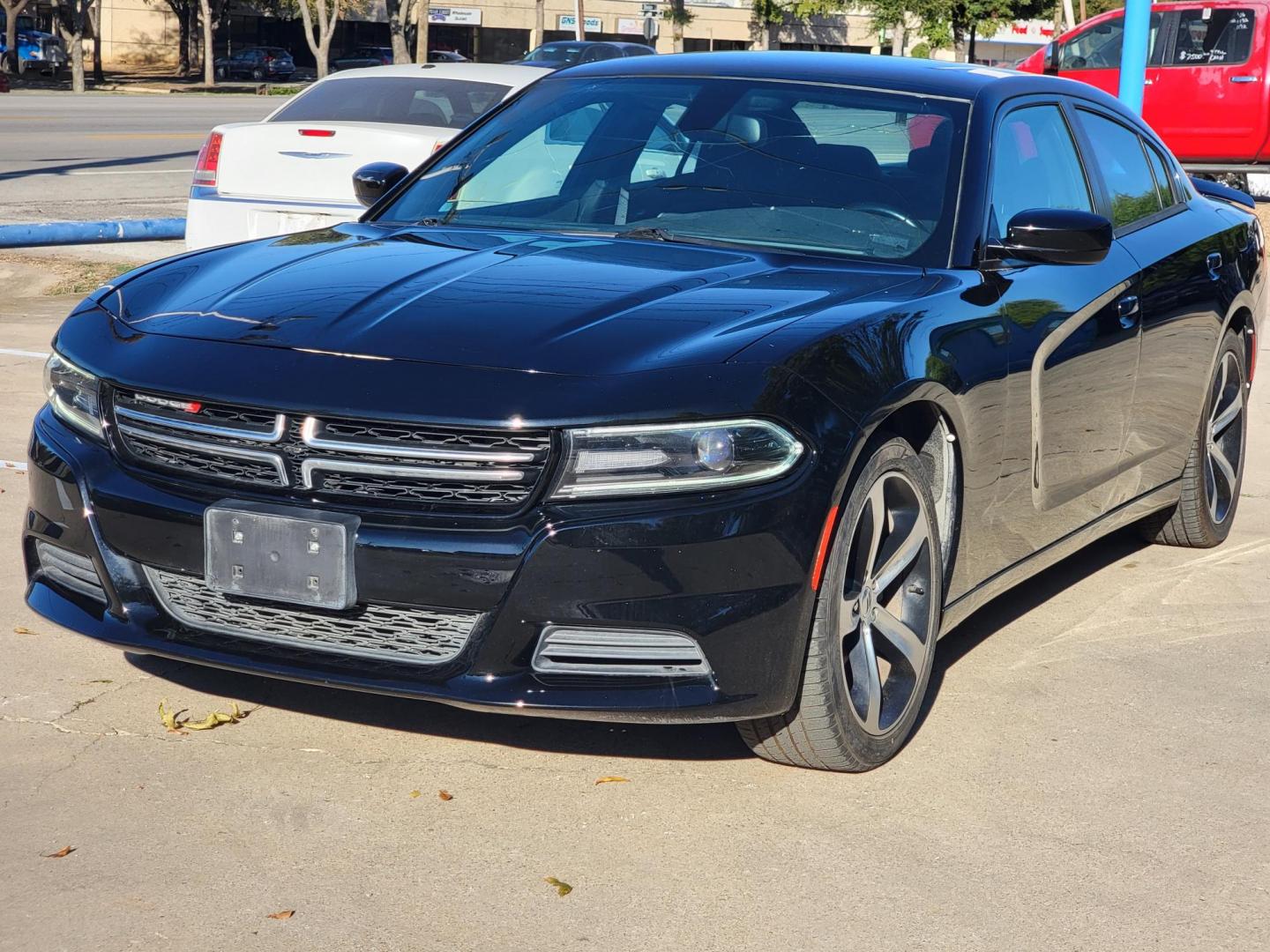2017 Black Dodge Charger SE (2C3CDXBG2HH) with an 3.6L V6 DOHC 24V engine, 8A transmission, located at 2020 East Division Street, Arlington, TX, 76011, (817) 801-3191, 32.742390, -97.076874 - Photo#6