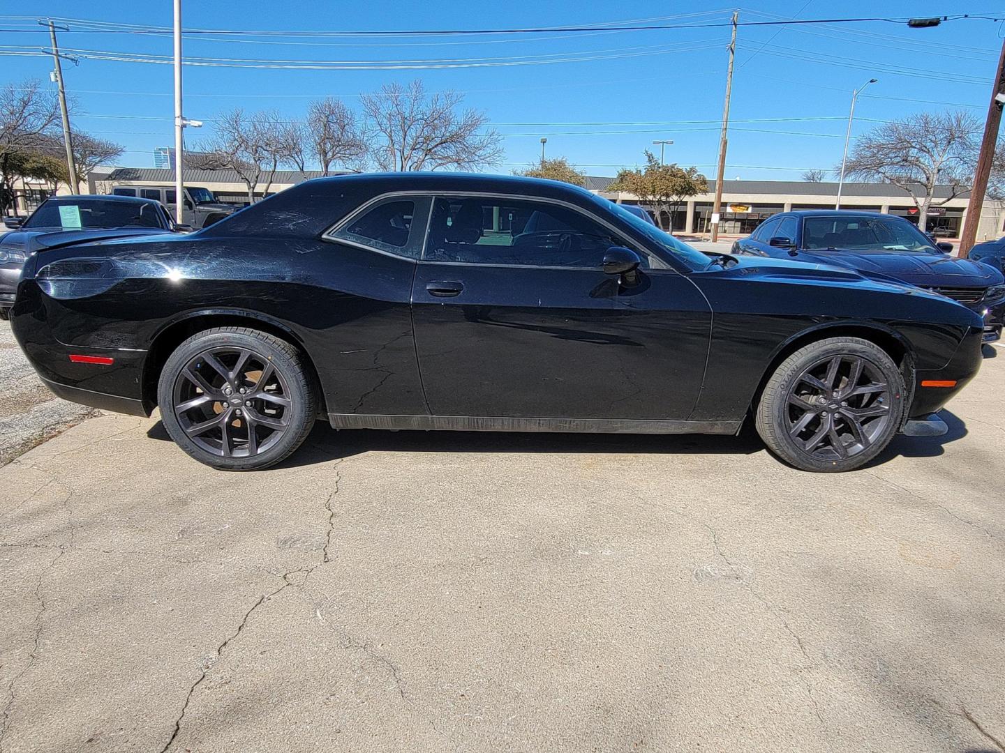 2020 Black Dodge Challenger SXT (2C3CDZAG8LH) with an 3.6L V6 DOHC 24V engine, 8A transmission, located at 2020 East Division Street, Arlington, TX, 76011, (817) 801-3191, 32.742390, -97.076874 - Photo#1