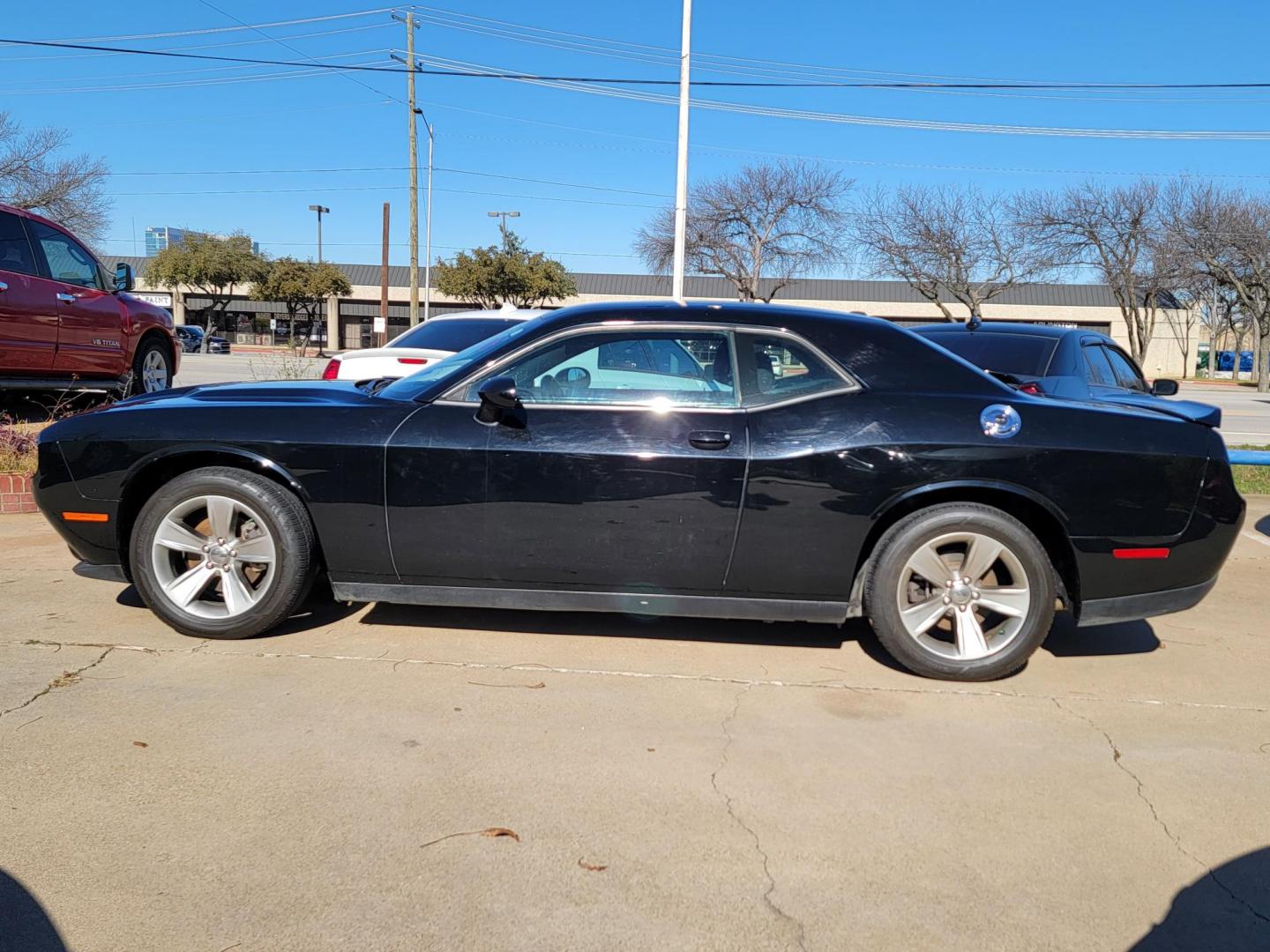 2021 Black Dodge Challenger SXT (2C3CDZAG9MH) with an 3.6L V6 DOHC 24V engine, 8A transmission, located at 2020 East Division Street, Arlington, TX, 76011, (817) 801-3191, 32.742390, -97.076874 - Photo#5