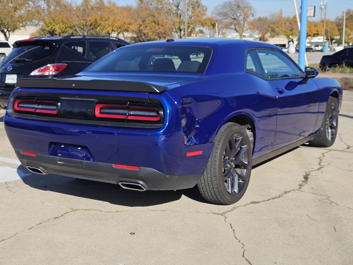 2022 Blue Dodge Challenger SXT (2C3CDZAG5NH) with an 3.6L V6 DOHC 24V engine, 8A transmission, located at 2020 East Division Street, Arlington, TX, 76011, (817) 801-3191, 32.742390, -97.076874 - Photo#2
