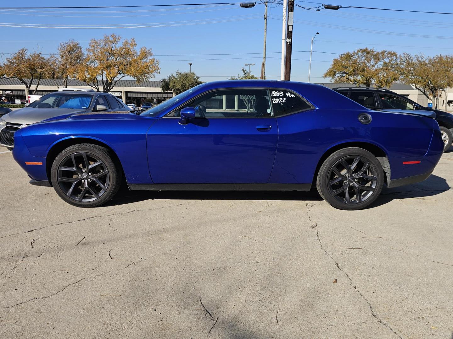 2022 Blue Dodge Challenger SXT (2C3CDZAG5NH) with an 3.6L V6 DOHC 24V engine, 8A transmission, located at 2020 East Division Street, Arlington, TX, 76011, (817) 801-3191, 32.742390, -97.076874 - Photo#5