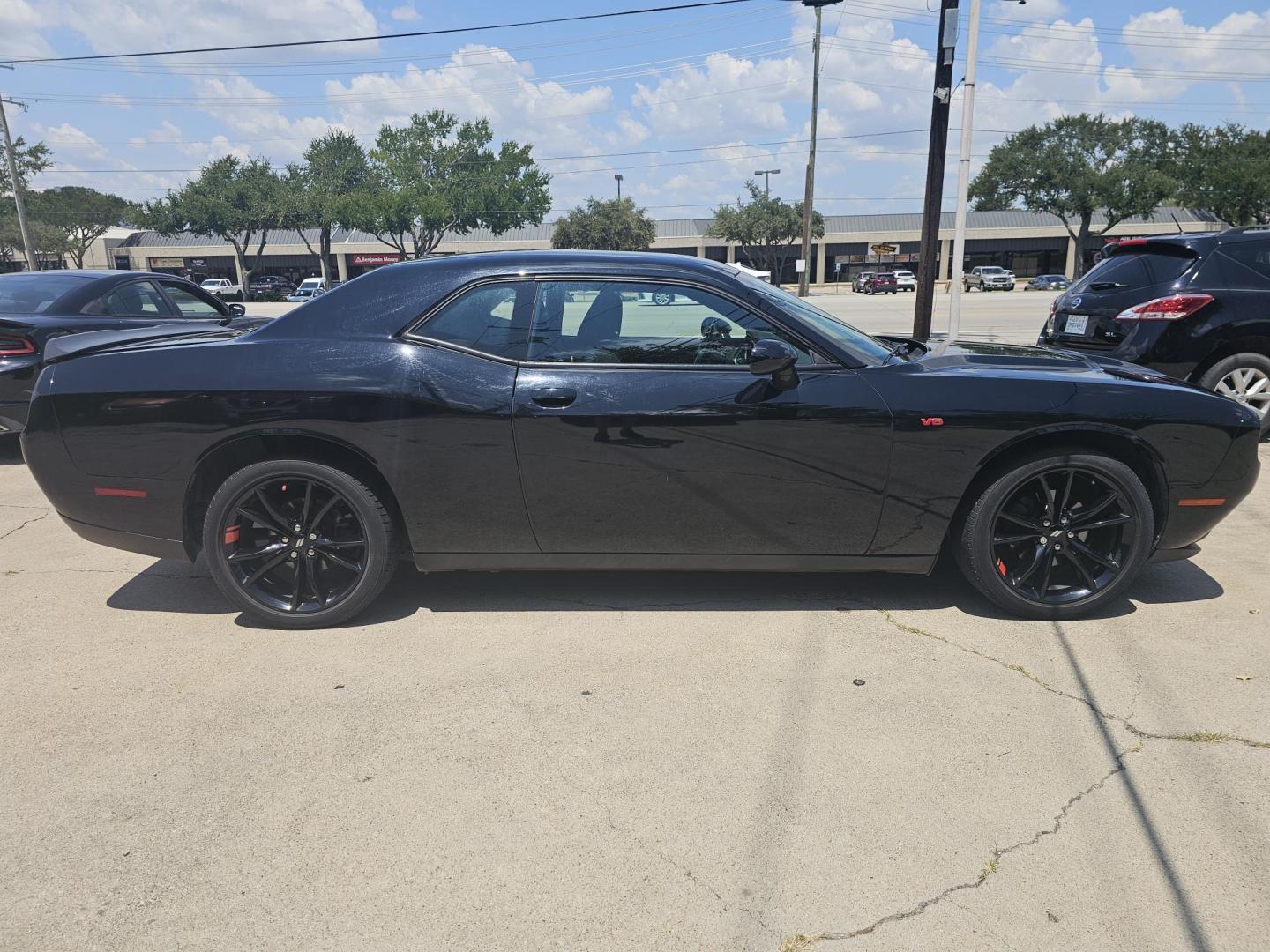 2018 Black Dodge Challenger SXT (2C3CDZAG9JH) with an 3.6L V6 DOHC 24V engine, 8A transmission, located at 2020 East Division Street, Arlington, TX, 76011, (817) 801-3191, 32.742390, -97.076874 - Photo#1