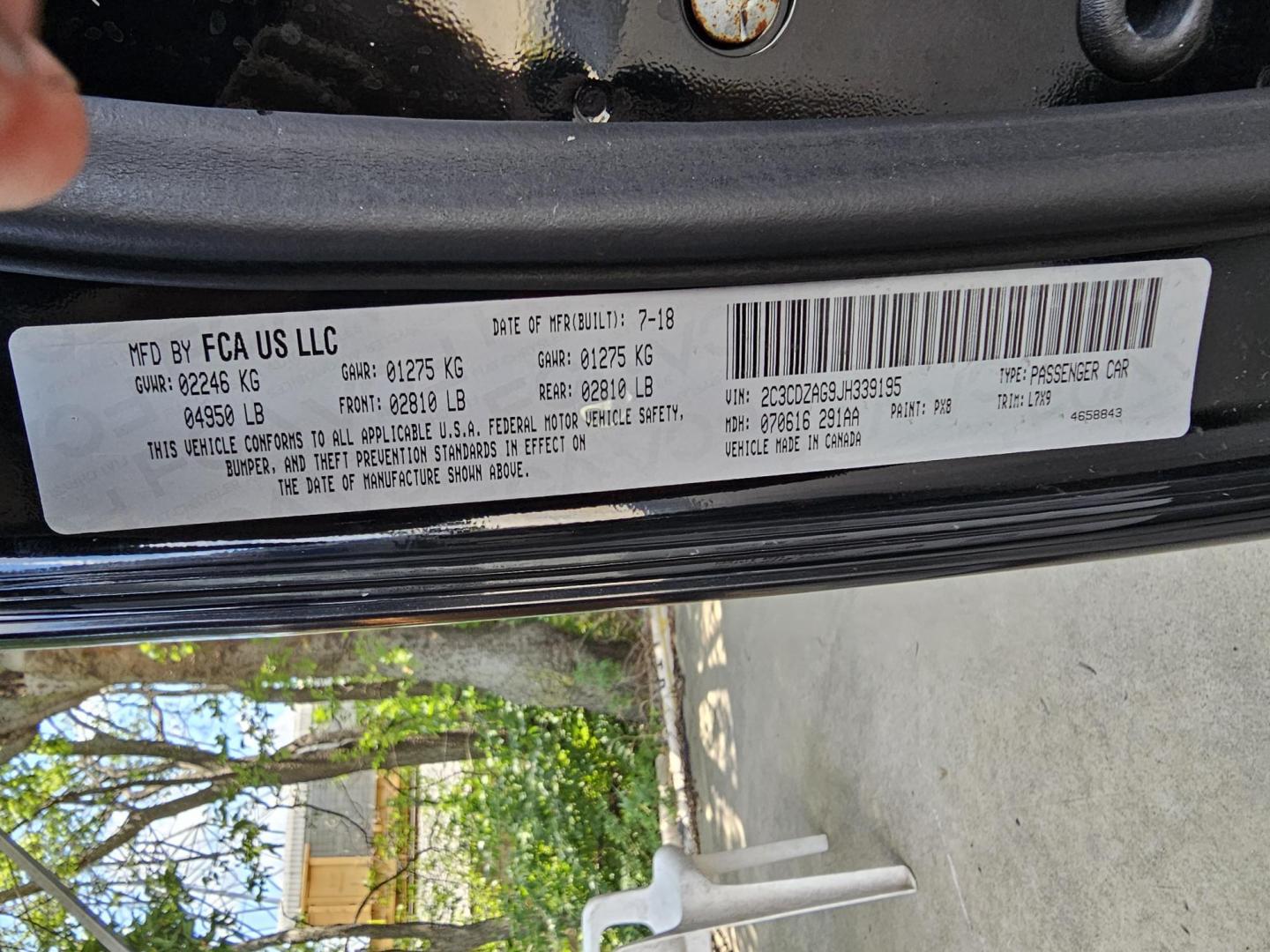 2018 Black Dodge Challenger SXT (2C3CDZAG9JH) with an 3.6L V6 DOHC 24V engine, 8A transmission, located at 2020 East Division Street, Arlington, TX, 76011, (817) 801-3191, 32.742390, -97.076874 - Photo#27